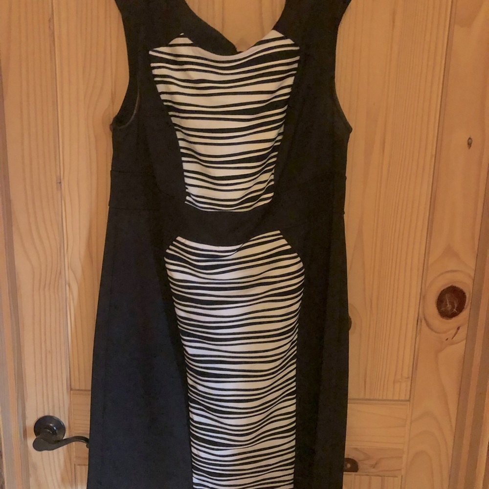 18W black New York knee length dress with slimming line design